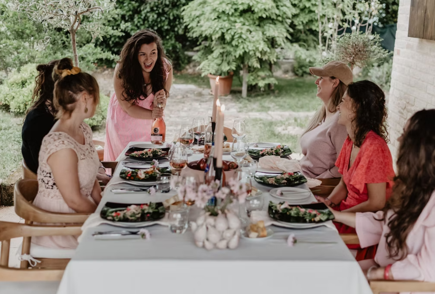 Women gathered for group dining at the Le Marche estate